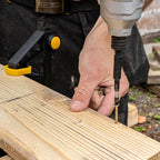 XTrade X0900075 Drill & Impact Drive Set in use screwing into wood