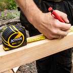 XTrade X0900032 Metric/Imperial Tape Measure 8m measuring up on jobsite