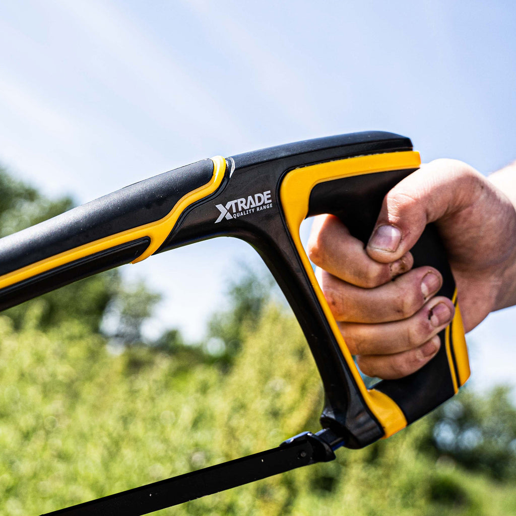 XTrade X0900020 Pro Heavy Duty Hacksaw 300mm (12") in use outdoors