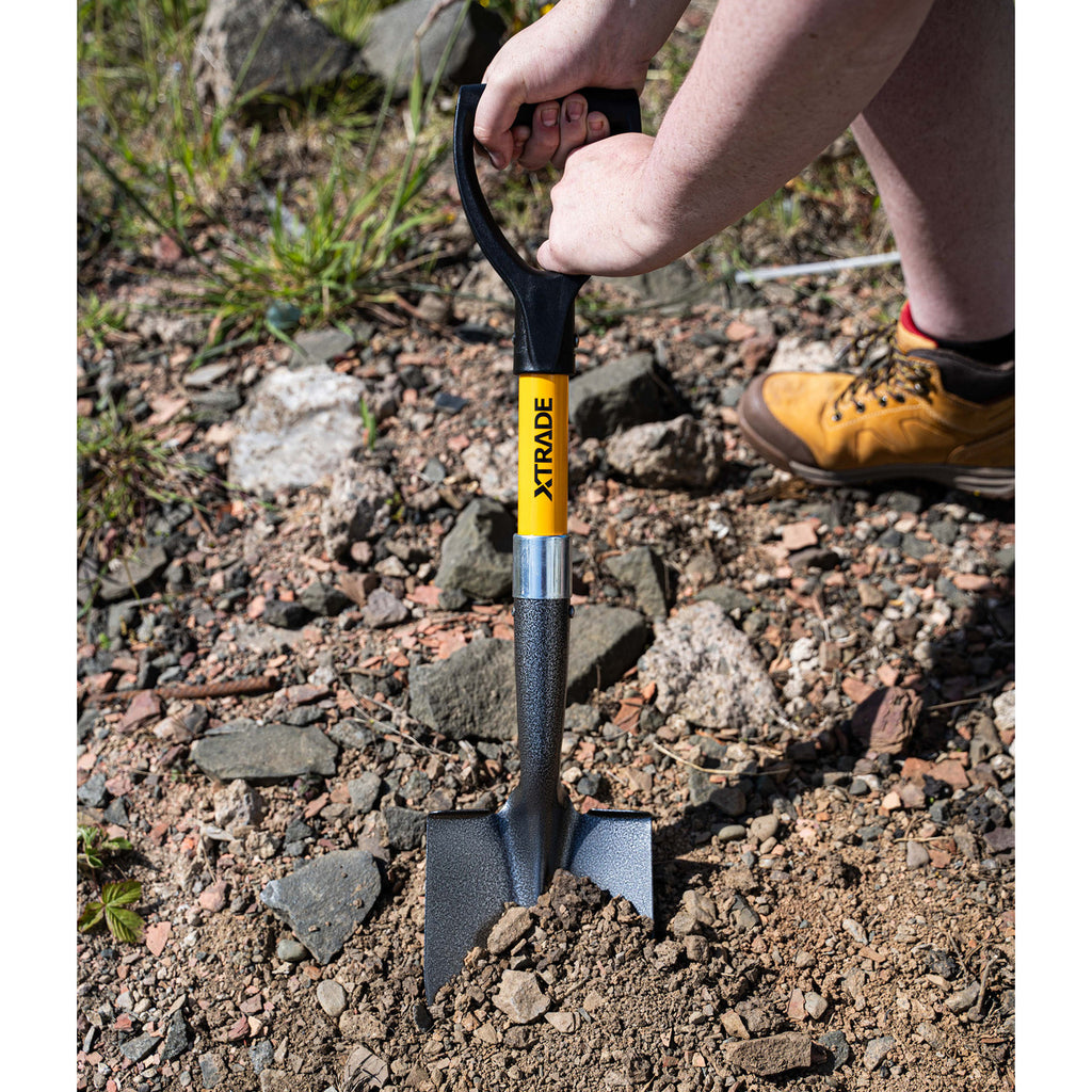 XTrade X1300001 Round Point Micro Shovel digging a hole