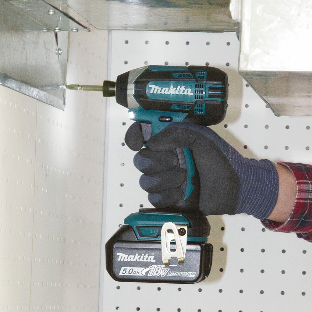Makita DLX2145TJ 18V Combi Drill & Impact Driver Twin Pack (2 x 5.0Ah Batteries) driver in use in tight space