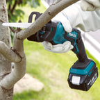 Makita DJR185Z 18V LXT Mini Reciprocating Saw (Body Only) in use sawing a branch