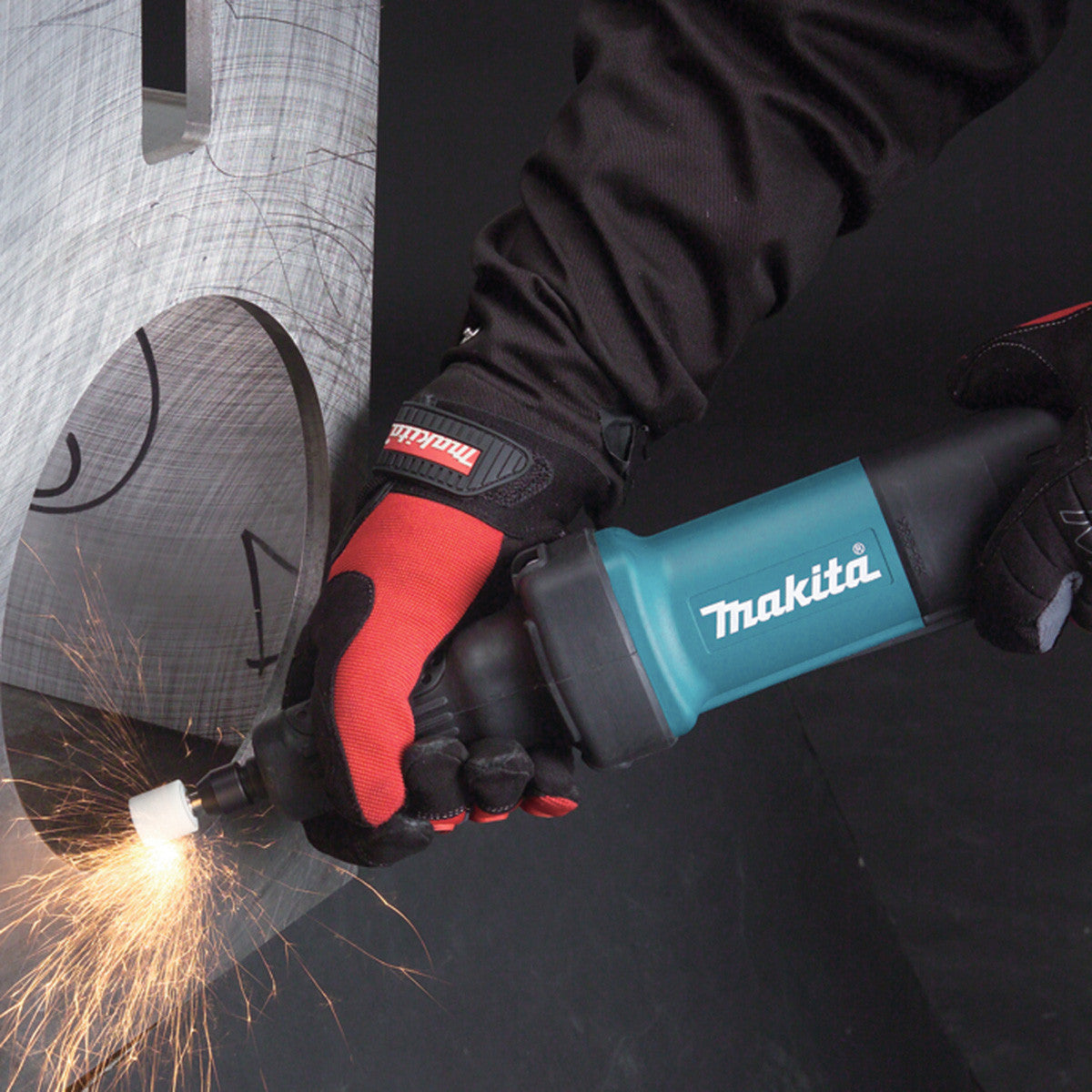 Makita GD0600 Die Grinder (110V) in use grinding metal