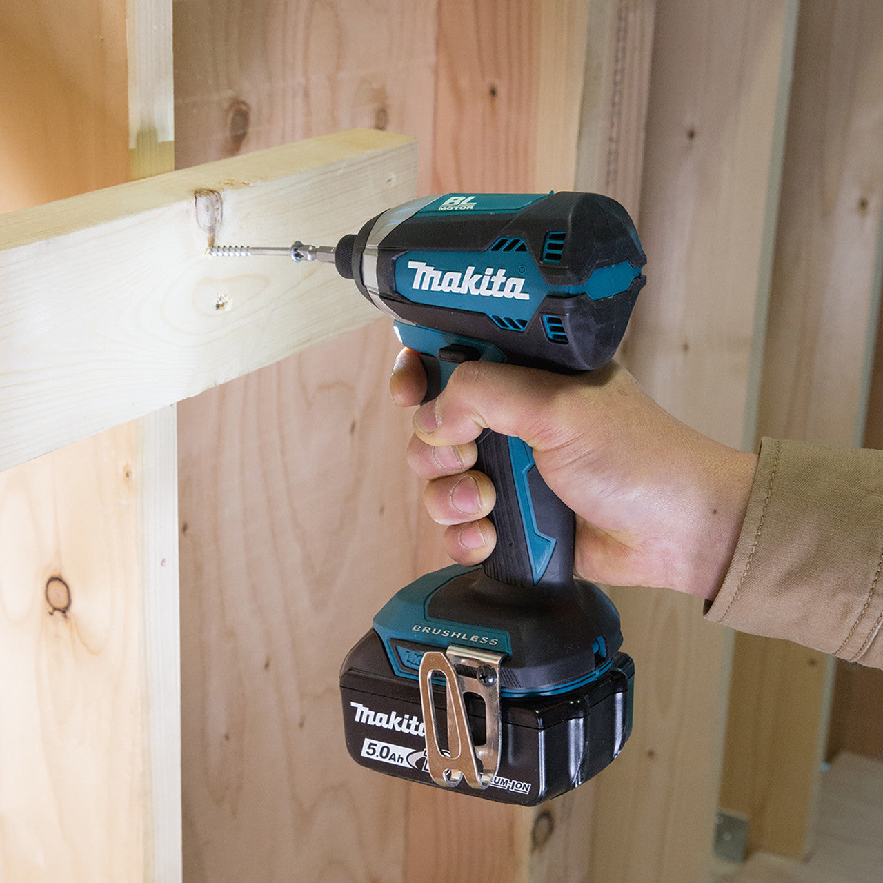 Makita DTD153Z 18V LXT Brushless Impact Driver (Body Only) in use screwing into wood