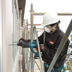 Makita DHR202Z 18V LXT SDS Plus Rotary Hammer Drill (Body Only) in use drilling into wall