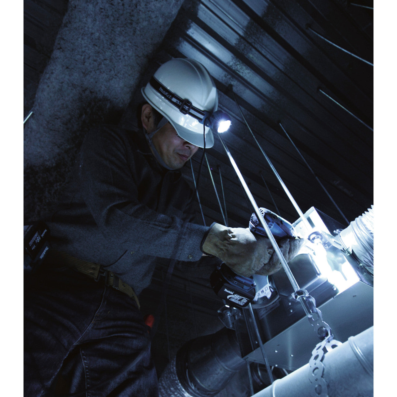 Makita DML800 14.4V / 18V LXT LED Headlight (Body Only) in use illuminating workspace