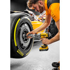 Dewalt DCF900N 18V XR Impact Wrench in use tightening F1 car wheel