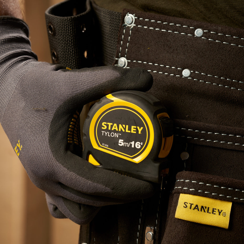 Stanley 0-30-696 Metric/Imperial Tylon Pocket Tape Measure 5m in use on tool belt