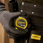 Stanley 0-30-696 Metric/Imperial Tylon Pocket Tape Measure 5m in use on tool belt