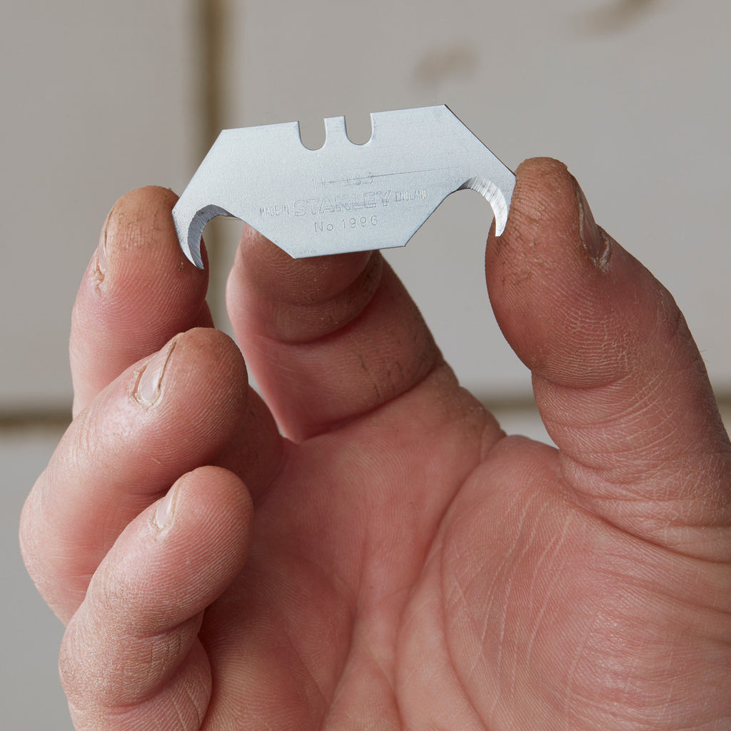 Stanley 0-11-983 Hooked Knife Blade held in hand