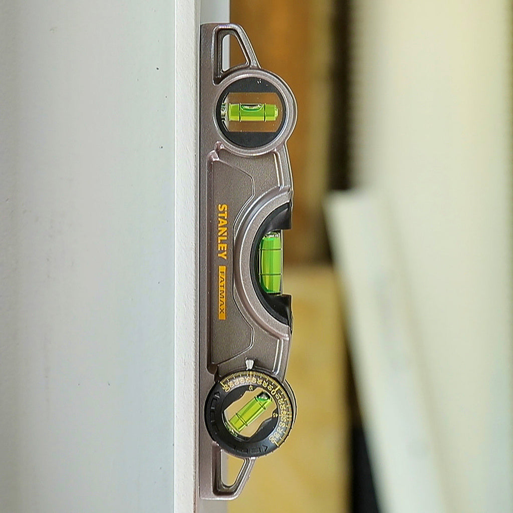 Stanley 250mm / 10" FatMax Xtreme Torpedo Level 3 Vials (0-43-609) in use 3