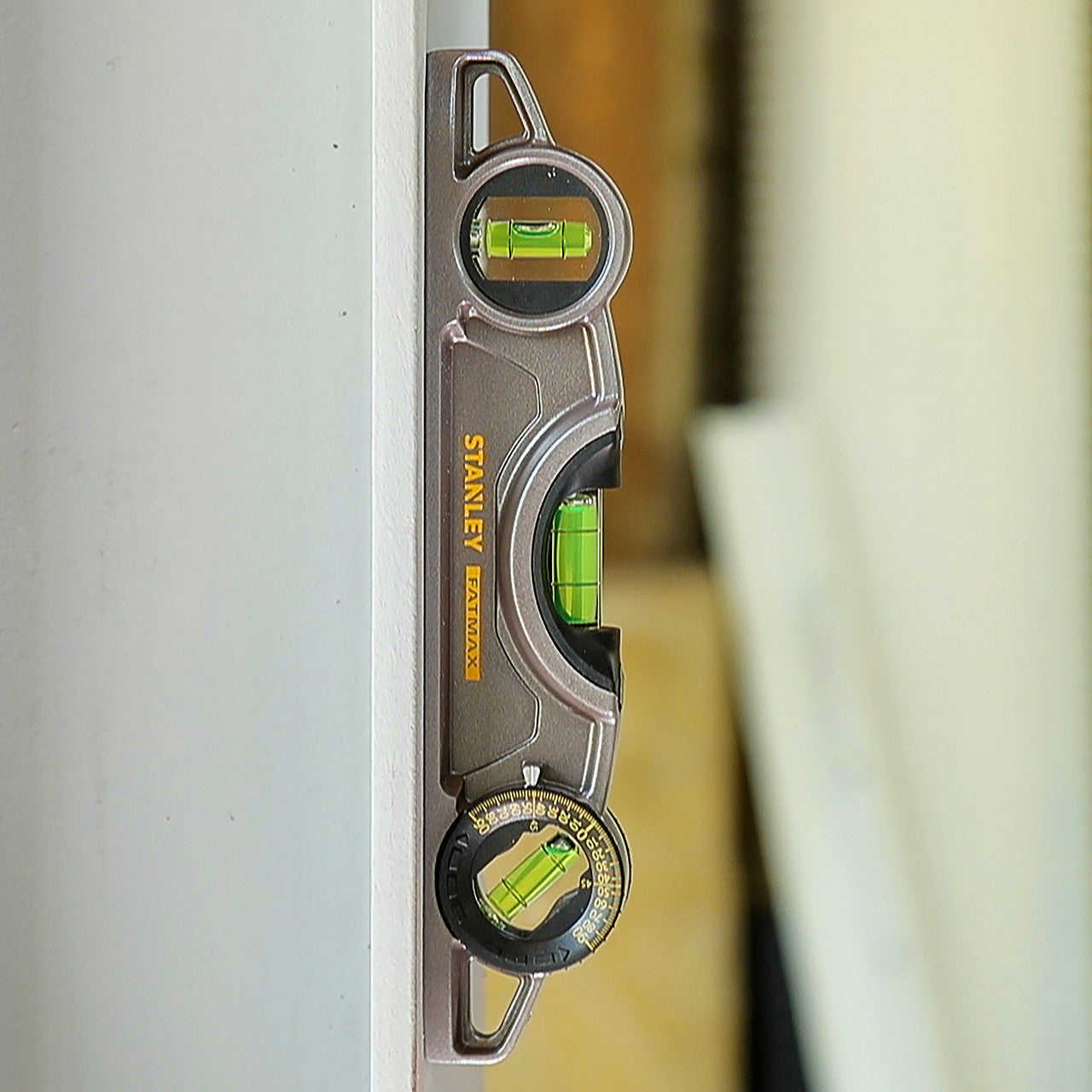 Stanley 250mm / 10" FatMax Xtreme Torpedo Level 3 Vials (0-43-609) in use 3