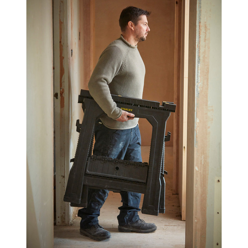 Stanley STST1-70713 Folding Saw Horse (Twin Pack) in use being transported