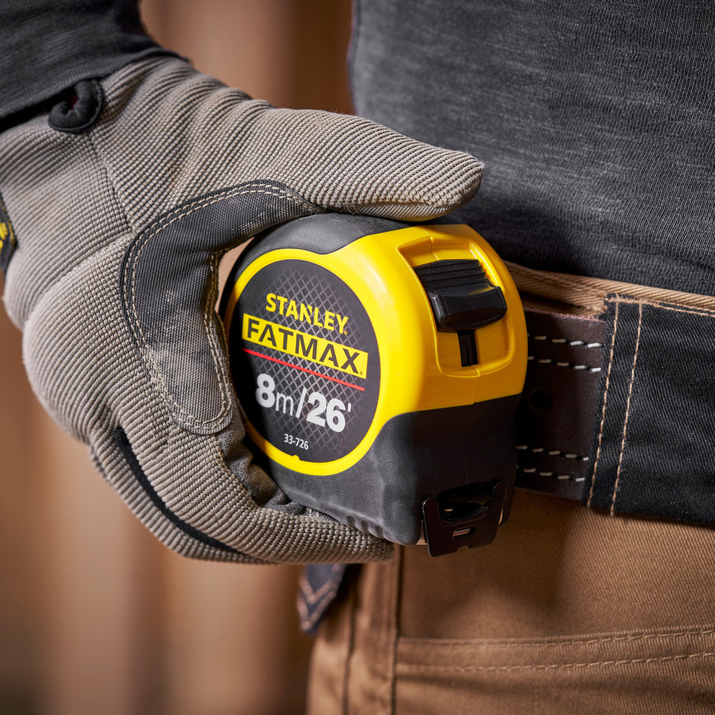 Stanley 0-33-726 FatMax Metric/Imperial Tape Measure with Blade Armor 8m being worn on the belt