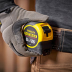Stanley 0-33-726 FatMax Metric/Imperial Tape Measure with Blade Armor 8m being worn on the belt