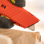 Stanley 0-10-189 Springback Safety Knife in use cutting cardboard