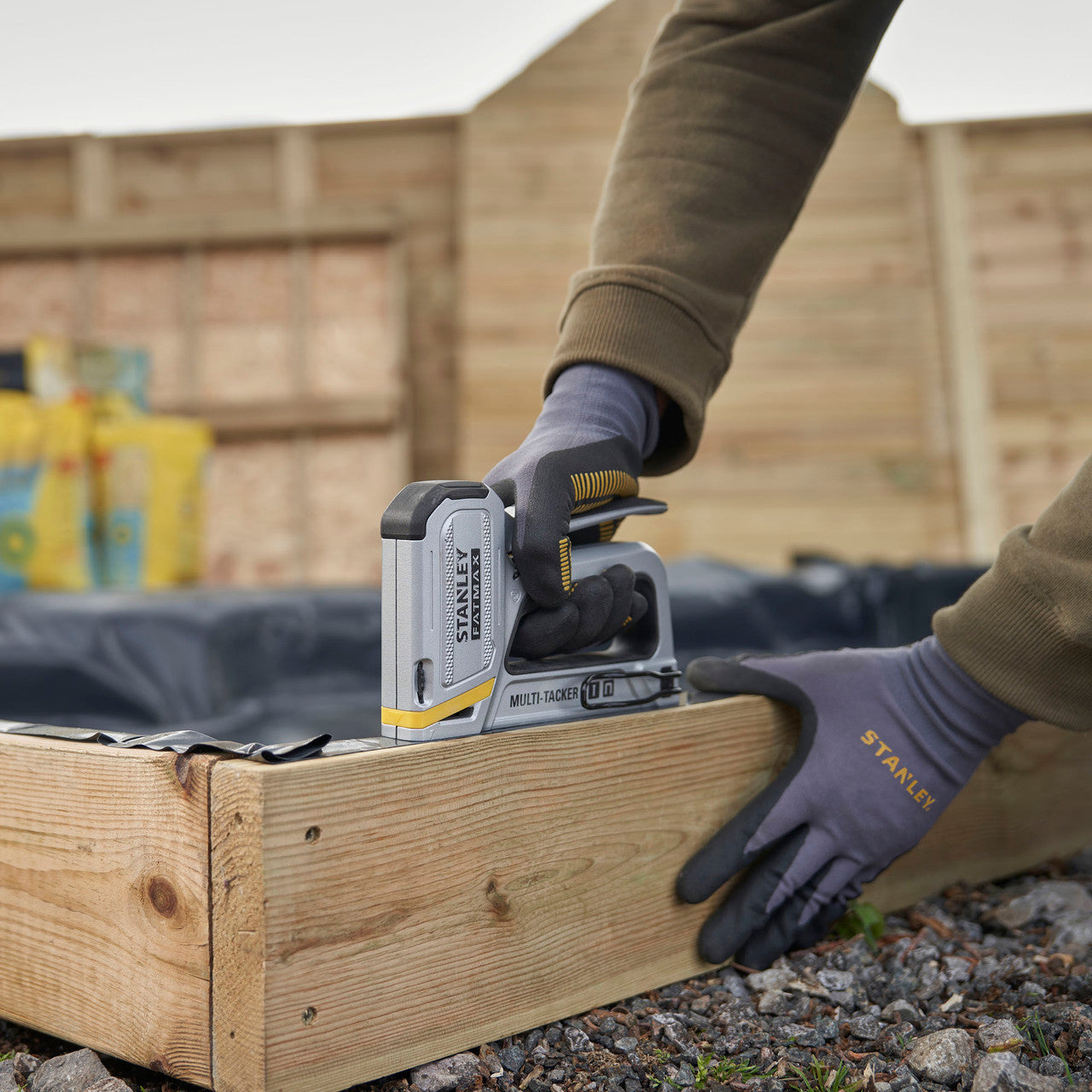 Stanley FMHT70250-0 FatMax 2-in-1 Multi-Tacker In Use on Wood