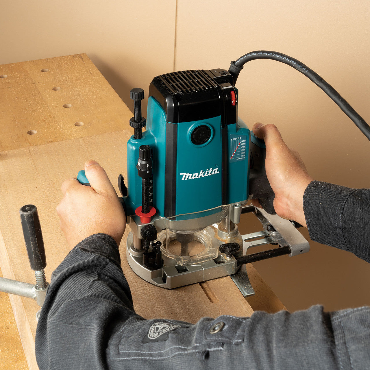 Makita RP2303FC/1 Router In Use